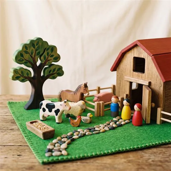 Wooden farm animals and small world play figures
